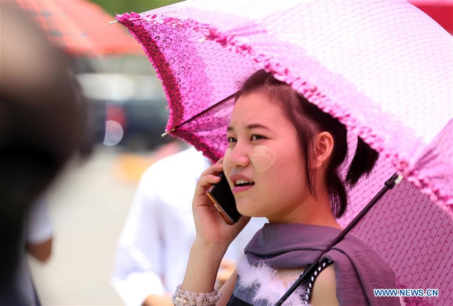 MYANMAR-YANGON-MOBILE PHONE USAGE-INCREASING