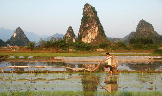 Farmers work across China