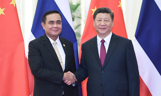 Xi meets Thai prime minister