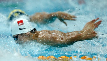 China's Ning Zetao competes in Men's 50m Butterfly Final at Beijing World Cup